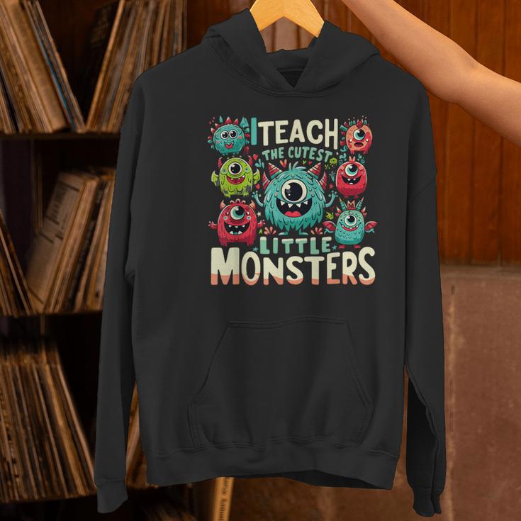 I Teach The Cutest Little Monsters Teacher Halloween Outfit Women's Hoodie, gift for family, gift for coworker