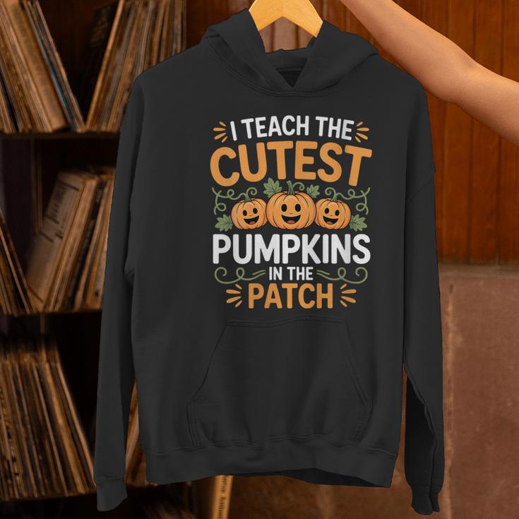 I Teach The Cutest Pumpkins In The Patch Halloween Teacher Women's Hoodie, gift for family, gift for coworker I Teach The Cutest Pumpkins In The Patch Halloween Teacher Women's Hoodie, gift for family, gift for coworker