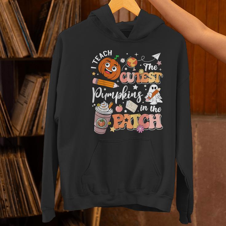 I Teach The Cutest Pumpkins In The Patch Halloween Teacher Women's Hoodie, gift for family, gift for coworker I Teach The Cutest Pumpkins In The Patch Halloween Teacher Women's Hoodie, gift for family, gift for coworker