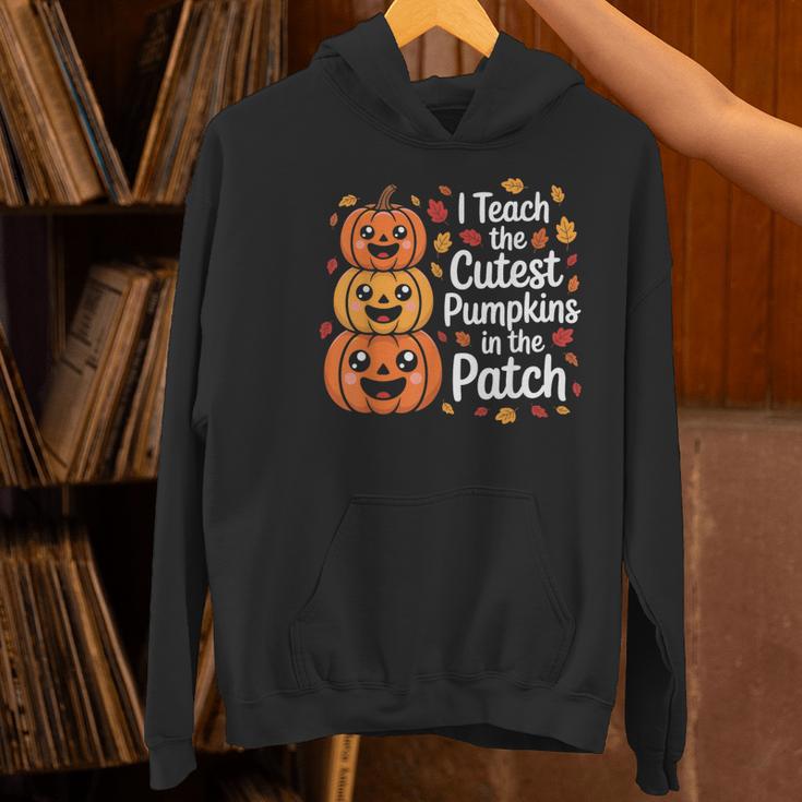 i Teach The Cutest Pumpkins In The Patch Teacher Halloween Women's Hoodie, gift for family, gift for coworker i Teach The Cutest Pumpkins In The Patch Teacher Halloween Women's Hoodie, gift for family, gift for coworker