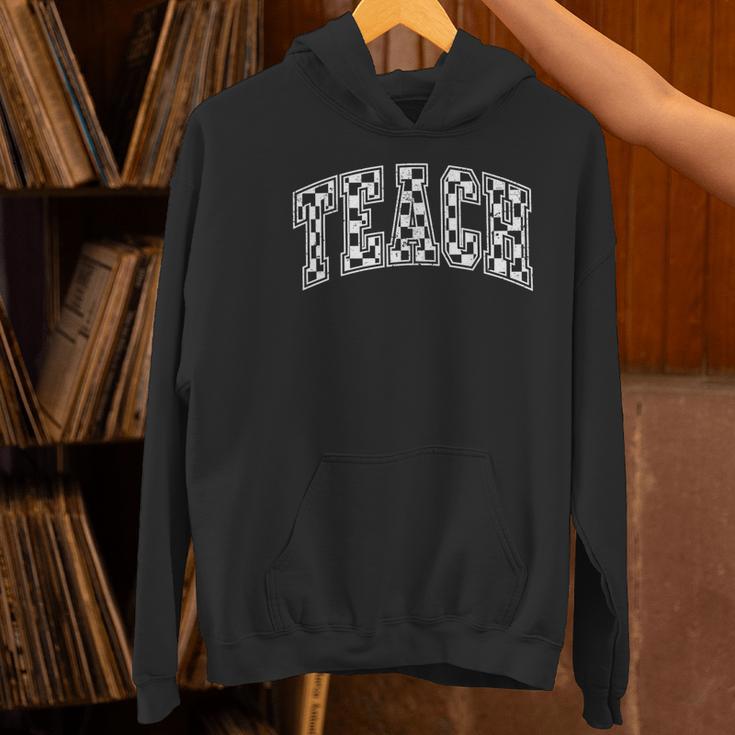 Teach Teacher Checkered First Day Of School Back To School Women's Hoodie, gift for family, gift for coworker Teach Teacher Checkered First Day Of School Back To School Women's Hoodie, gift for family, gift for coworker