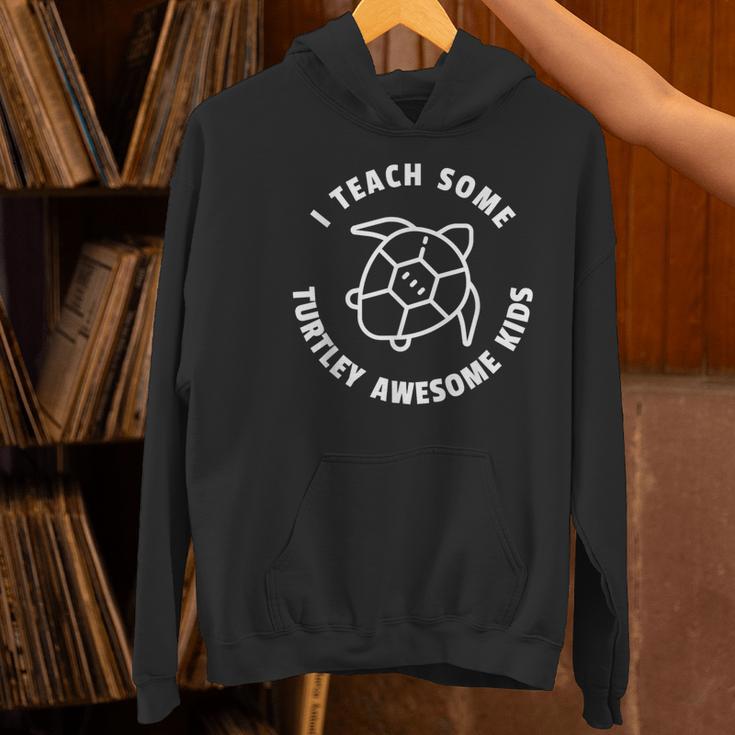 I Teach Some Turtley Awesome Kids Teacher Turtle Pun Women's Hoodie, gift for family, gift for coworker