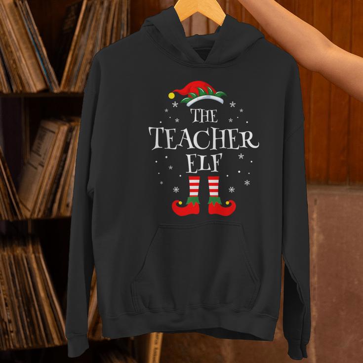 The Teacher Elf Christmas Family Matching Group Xmas Women's Hoodie, gift for family, gift for coworker