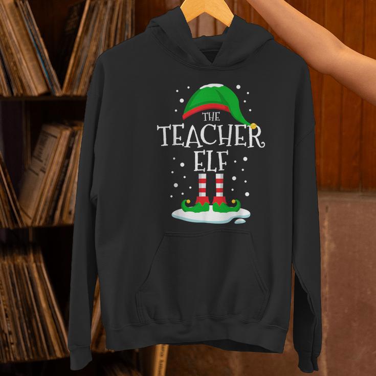 The Teacher Elf Christmas Family Matching Xmas Group For Men Women Women's Hoodie, gift for family, gift for coworker The Teacher Elf Christmas Family Matching Xmas Group For Men Women Women's Hoodie, gift for family, gift for coworker