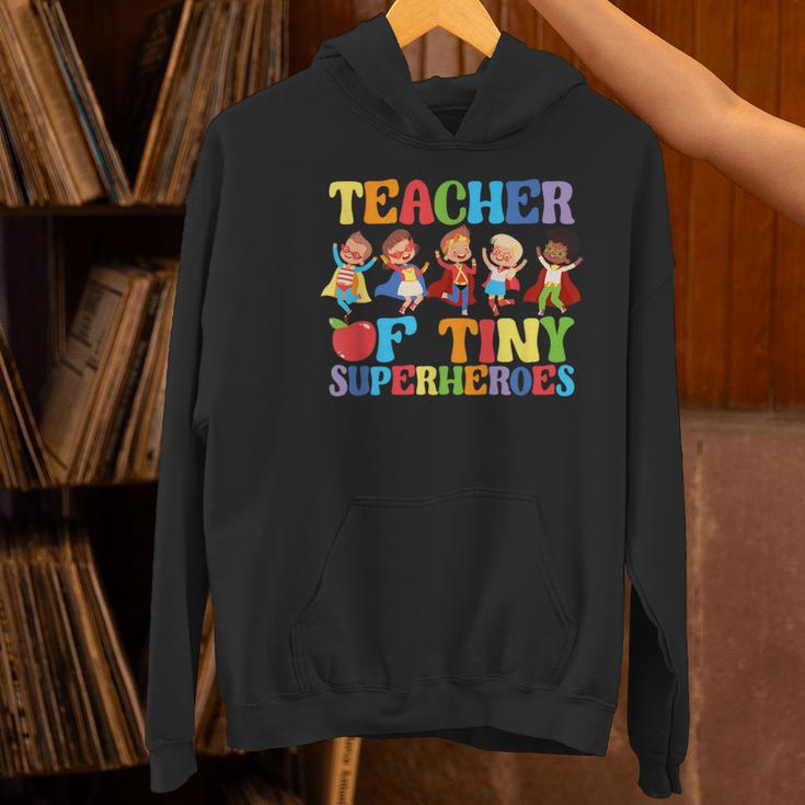 Teacher Of Tiny Superheroes Teach 100th Day Of School Women's Hoodie, gift for family, gift for coworker Teacher Of Tiny Superheroes Teach 100th Day Of School Women's Hoodie, gift for family, gift for coworker