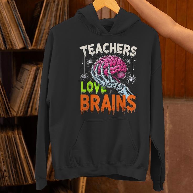 Teachers Love Brains Halloween 2025 Skeleton Costume Women's Hoodie, gift for family, gift for coworker