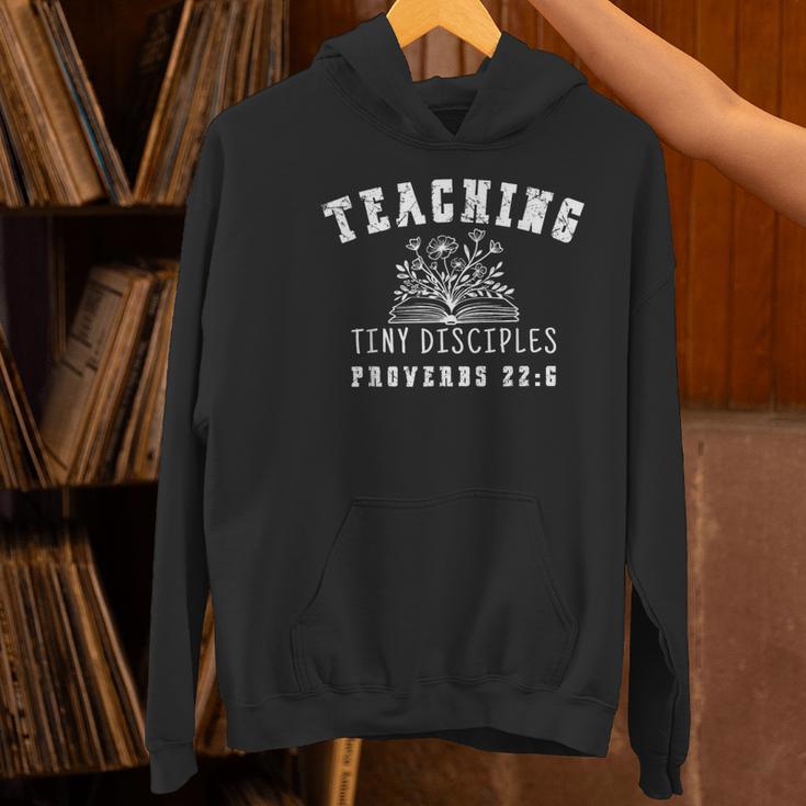 Teaching Tiny Disciples Christian Bible Verse Teacher Women's Hoodie, gift for family, gift for coworker Teaching Tiny Disciples Christian Bible Verse Teacher Women's Hoodie, gift for family, gift for coworker