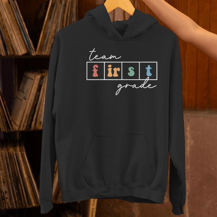 Team First Grade Back To School 1st Grade Teacher Kids Cute Women's Hoodie, First Grade Teacher Hoodies, gift for family, gift for coworker