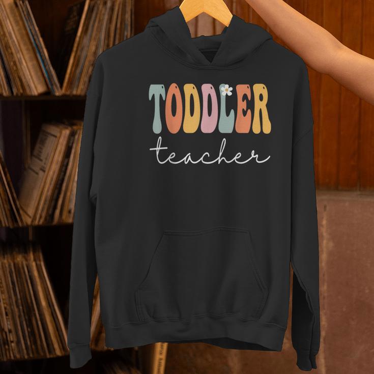 Toddler Teacher Retro Groovy Women Happy First Day Of School Women's Hoodie, Groovy Teacher Hoodies, gift for family, gift for coworker Toddler Teacher Retro Groovy Women Happy First Day Of School Women's Hoodie, Groovy Teacher Hoodies, gift for family, gift for coworker