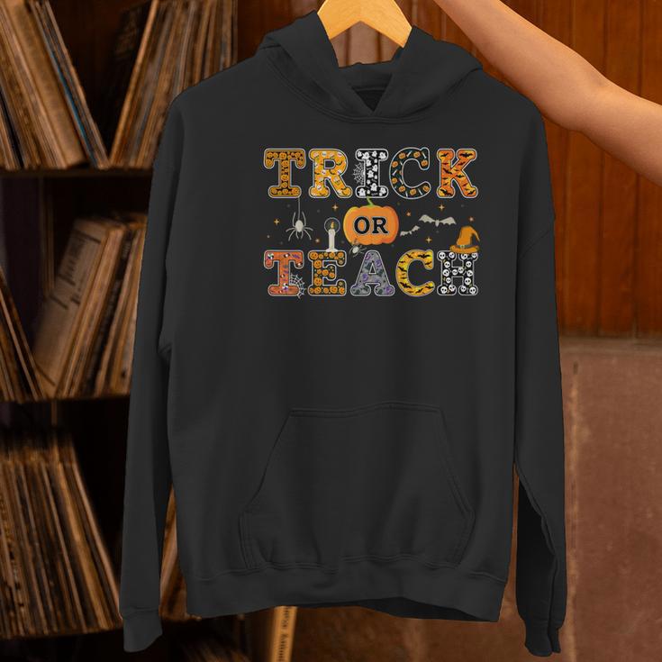 Trick Or Teach Funny School Teacher Halloween Costume Women's Hoodie, gift for family, gift for coworker Trick Or Teach Funny School Teacher Halloween Costume Women's Hoodie, gift for family, gift for coworker