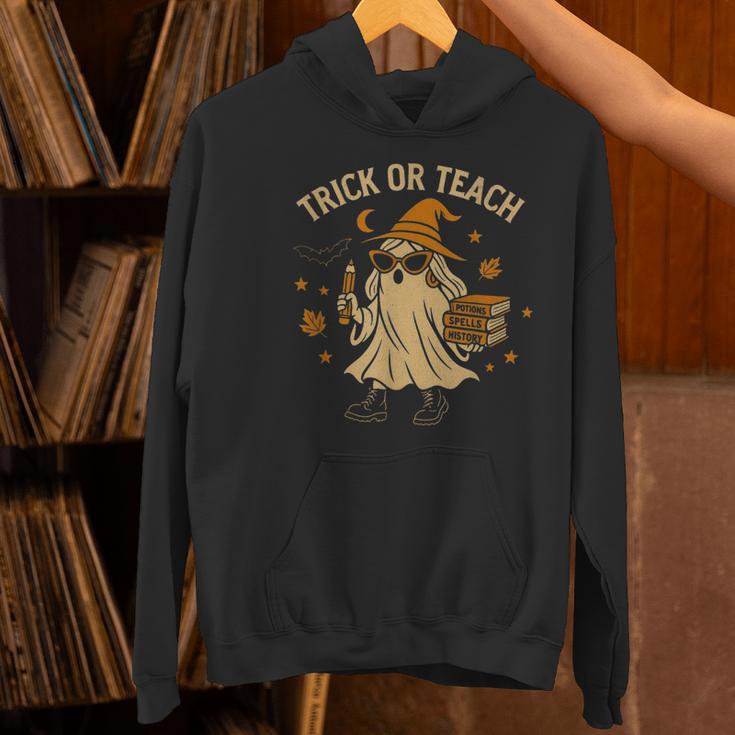 Trick Or Teach Halloween Teacher Women's Hoodie, gift for family, gift for coworker