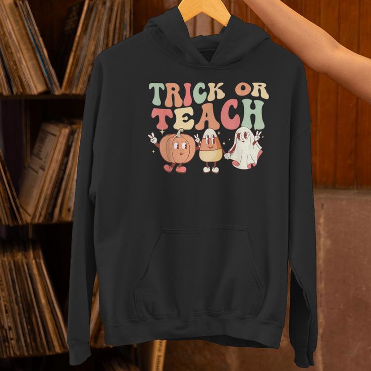 Trick Or Teach Pumpkin Candy Corn Ghost Halloween Teacher Women's Hoodie, gift for family, gift for coworker Trick Or Teach Pumpkin Candy Corn Ghost Halloween Teacher Women's Hoodie, gift for family, gift for coworker