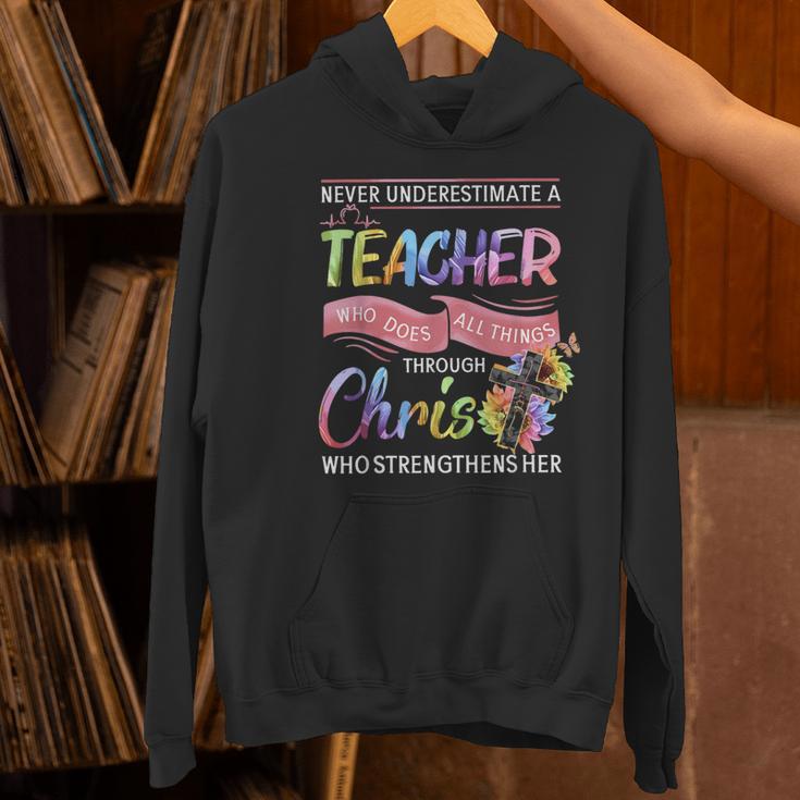Never Underestimate A Teacher Does All Things Through Christ For Men Women Women's Hoodie, gift for family, gift for coworker Never Underestimate A Teacher Does All Things Through Christ For Men Women Women's Hoodie, gift for family, gift for coworker