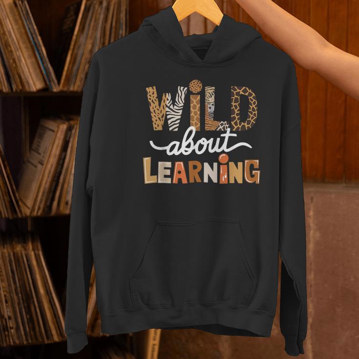 Wild About Learning Back To School First Day Teacher Student Women's Hoodie, gift for family, gift for coworker