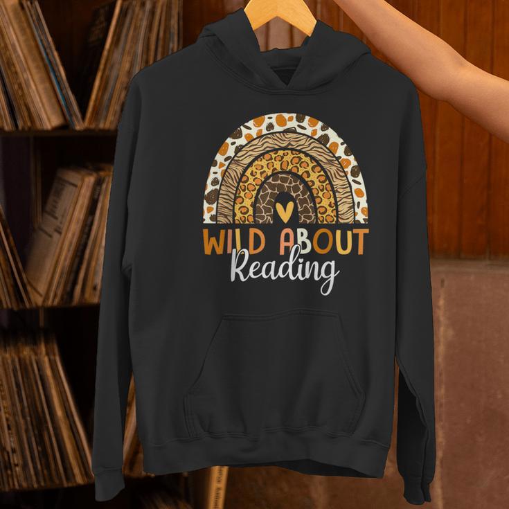 Wild About Reading Teacher Back To School Leopard Rainbow Women's Hoodie, gift for family, gift for coworker