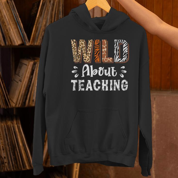 Wild About Teaching Teacher Lover Animals Leopard Zebra Women's Hoodie, gift for family, gift for coworker Wild About Teaching Teacher Lover Animals Leopard Zebra Women's Hoodie, gift for family, gift for coworker