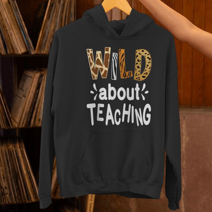 Wild About Teaching Teacher Student First Day Of School Women's Hoodie, gift for family, gift for coworker