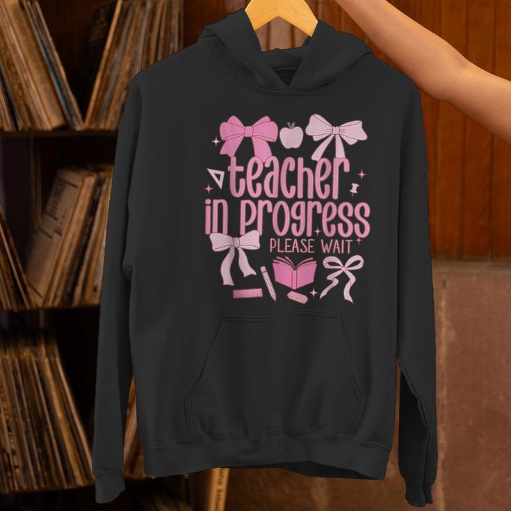 Women Teacher In Progress Coquette Pink Bow Future Teacher Women's Hoodie, Future Teacher Hoodies, gift for family, gift for coworker