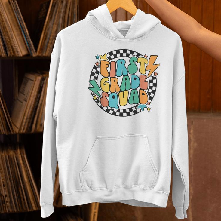 Back To School Groovy Teacher 1st First Grade Crew Squad Women's Hoodie, Groovy Teacher Hoodies, First Grade Teacher Hoodies, gift for family, gift for coworker Back To School Groovy Teacher 1st First Grade Crew Squad Women's Hoodie, Groovy Teacher Hoodies, First Grade Teacher Hoodies, gift for family, gift for coworker