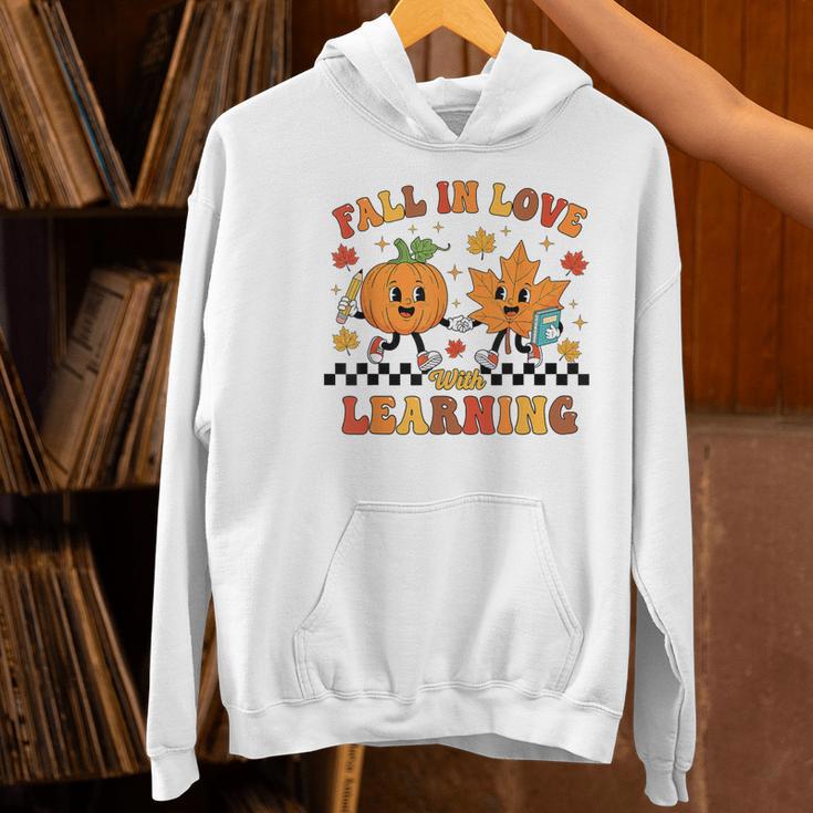 Fall In Love With Learning Teacher Student Autumn Pumpkin Women's Hoodie, gift for family, gift for coworker Fall In Love With Learning Teacher Student Autumn Pumpkin Women's Hoodie, gift for family, gift for coworker