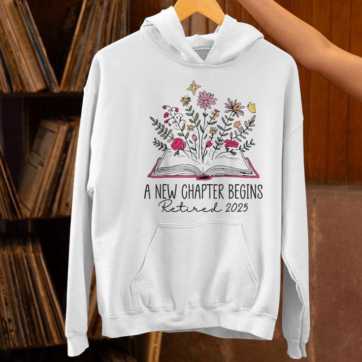 Floral Book a New Chapter Begins Retired Retirement Teacher Women's Hoodie, gift for family, gift for coworker Floral Book a New Chapter Begins Retired Retirement Teacher Women's Hoodie, gift for family, gift for coworker