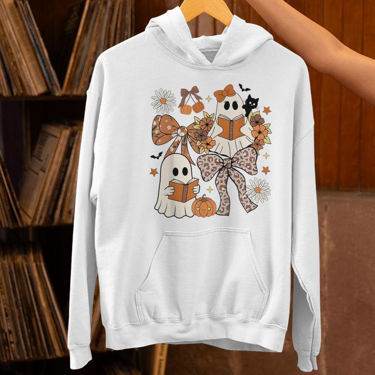 Ghost Reading Books Halloween Bow Spooky Teacher Student Women's Hoodie, gift for family, gift for coworker