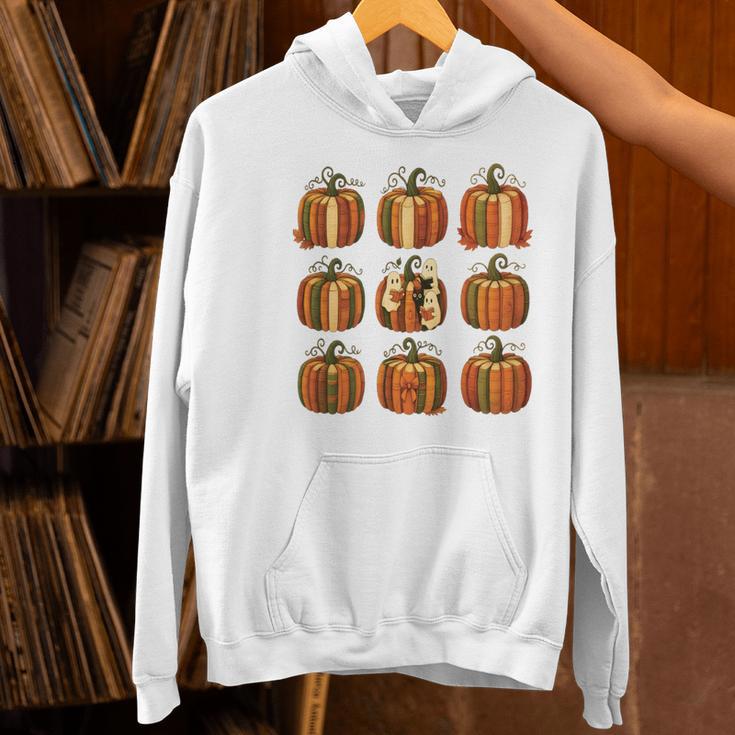 Halloween Teacher Fall Book Pumpkin Retro Reading Women's Hoodie, gift for family, gift for coworker