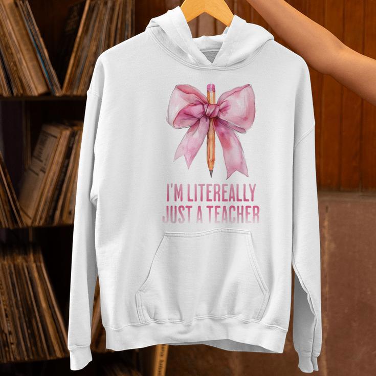 I'm Literally Just a Teacher Pencil Coquette Bow School Women's Hoodie, gift for family, gift for coworker I'm Literally Just a Teacher Pencil Coquette Bow School Women's Hoodie, gift for family, gift for coworker
