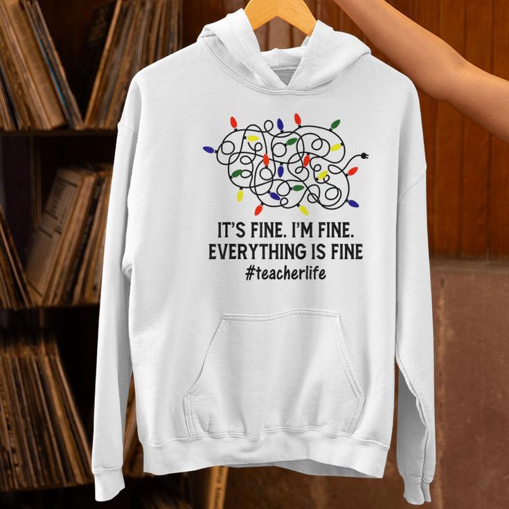 It's Fine I'm Fine Christmas Lights Teacher Xmas Women's Hoodie, gift for family, gift for coworker It's Fine I'm Fine Christmas Lights Teacher Xmas Women's Hoodie, gift for family, gift for coworker