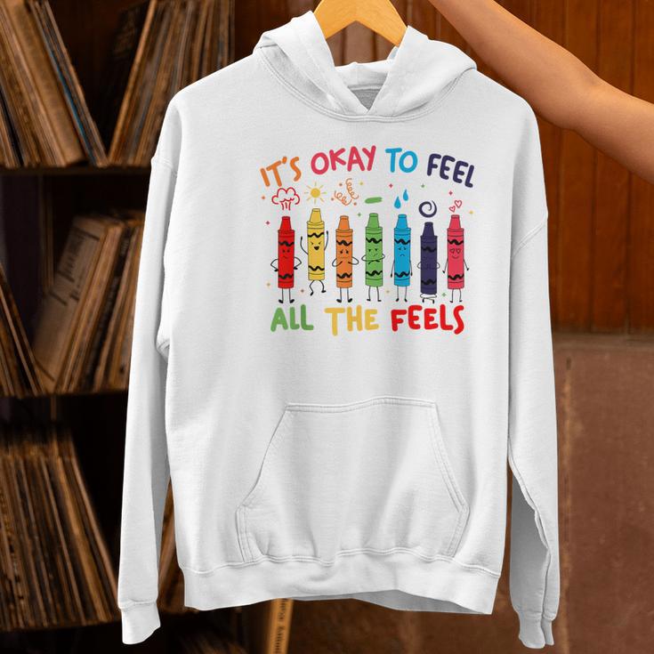 Its Okay To Feel All The Feels Mood Color Crayons Teacher Women's Hoodie, gift for family, gift for coworker Its Okay To Feel All The Feels Mood Color Crayons Teacher Women's Hoodie, gift for family, gift for coworker