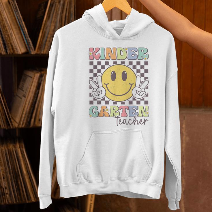 Kindergarten Teacher Team Hippie Smile Face Back To School Women's Hoodie, gift for family, gift for coworker