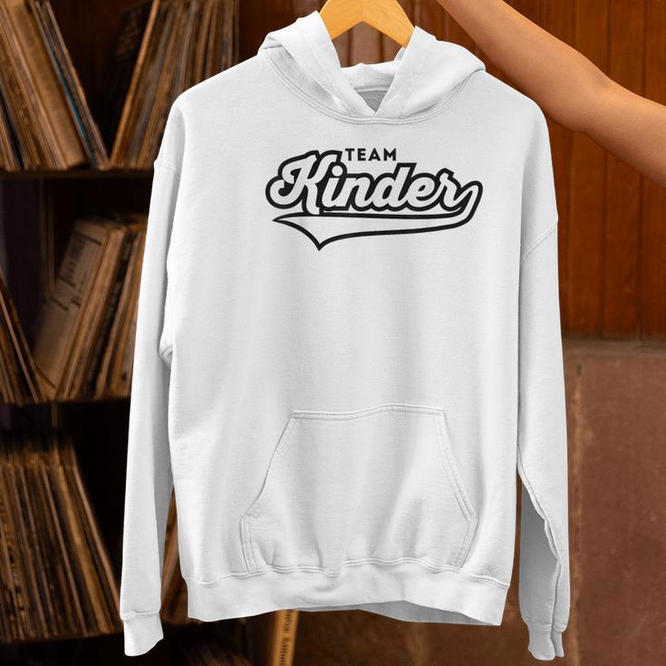 Kindergarten TEAM School Teacher Kinder Baseball-Style Shirt Women's Hoodie, gift for family, gift for coworker Kindergarten TEAM School Teacher Kinder Baseball-Style Shirt Women's Hoodie, gift for family, gift for coworker