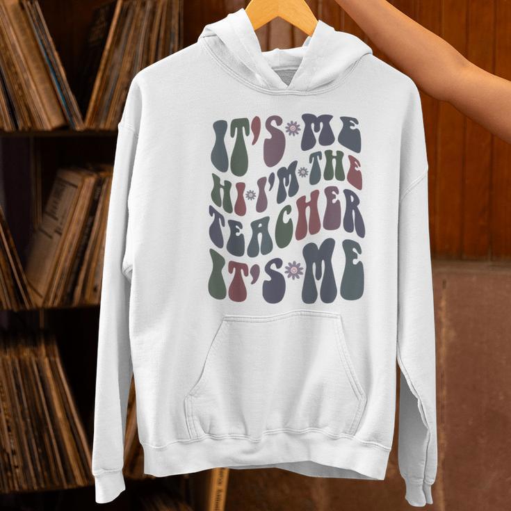 Retro IT'S ME Hi I'm The TEACHER Groovy Testing Squad Pink Women's Hoodie, Groovy Teacher Hoodies, gift for family, gift for coworker