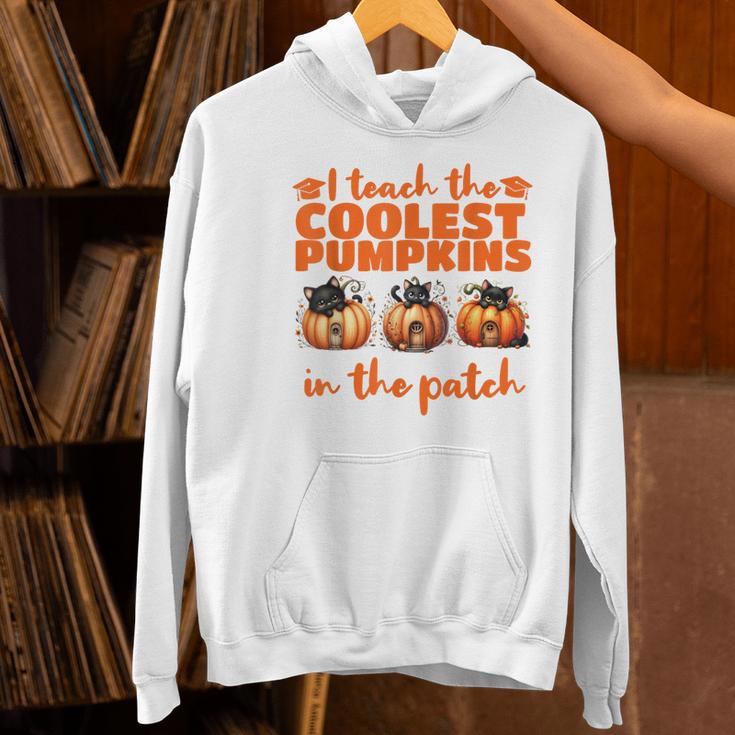 I Teach The Cutest Pumpkins Halloween Teacher Cat Lover Women's Hoodie, gift for family, gift for coworker I Teach The Cutest Pumpkins Halloween Teacher Cat Lover Women's Hoodie, gift for family, gift for coworker