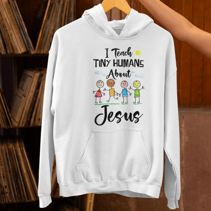 I Teach Tiny Humans About Jesus Sunday School Teacher Women's Hoodie, gift for family, gift for coworker I Teach Tiny Humans About Jesus Sunday School Teacher Women's Hoodie, gift for family, gift for coworker