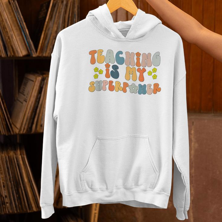 Teaching Is My Superpower Vintage Groovy University Teacher Women's Hoodie, Groovy Teacher Hoodies, gift for family, gift for coworker Teaching Is My Superpower Vintage Groovy University Teacher Women's Hoodie, Groovy Teacher Hoodies, gift for family, gift for coworker
