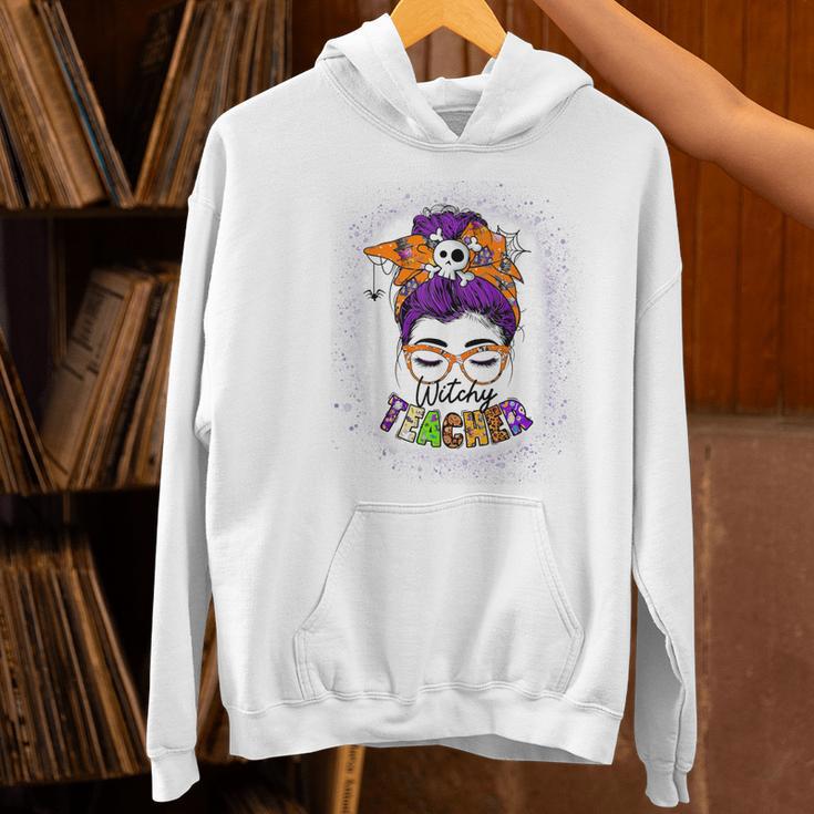 Witchy Teacher Halloween Messy Bun Teacher Bleached Women's Hoodie, gift for family, gift for coworker Witchy Teacher Halloween Messy Bun Teacher Bleached Women's Hoodie, gift for family, gift for coworker