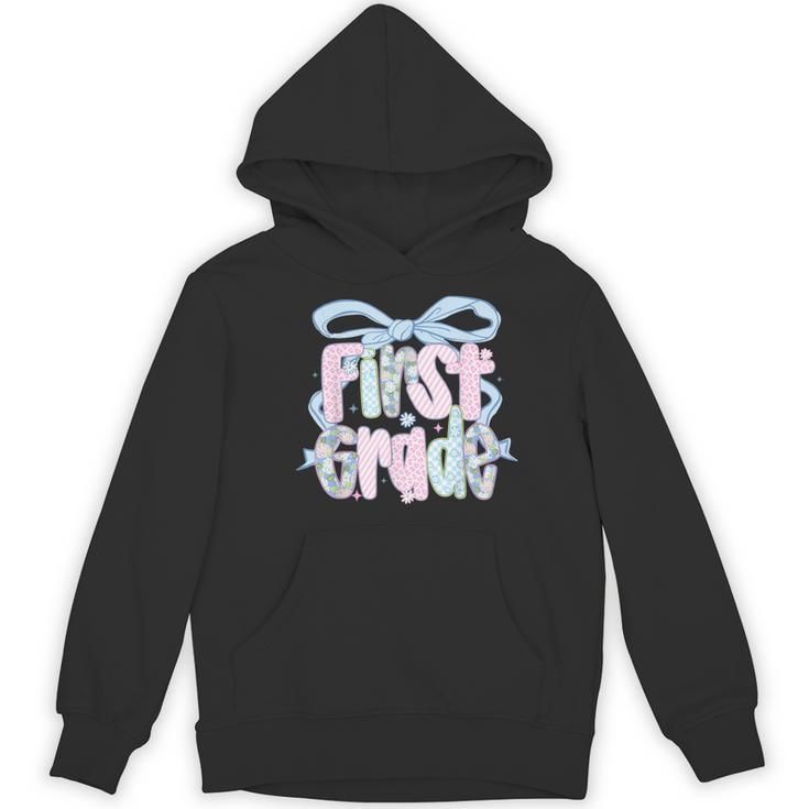 First Grade Coquette Bow Girls Teacher Team 1st Grade Squad Women's Hoodie, novelty gifts, funny gifts