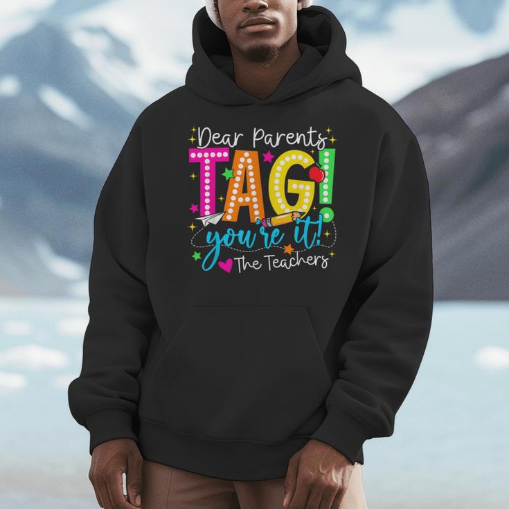 Dear Parents Tag You'Re It Love Teachers Last Day Of School Men Hoodie, funny design
