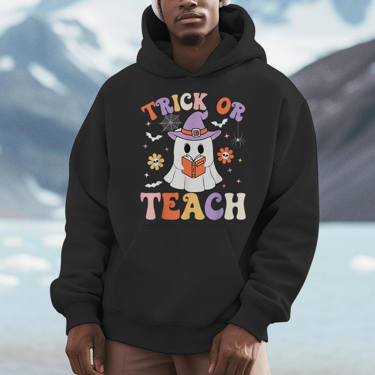 Trick Or Teach Teacher Groovy Ghost Halloween Teacher Men Hoodie, Groovy Teacher Gifts, funny design Trick Or Teach Teacher Groovy Ghost Halloween Teacher Men Hoodie, Groovy Teacher Gifts, funny design
