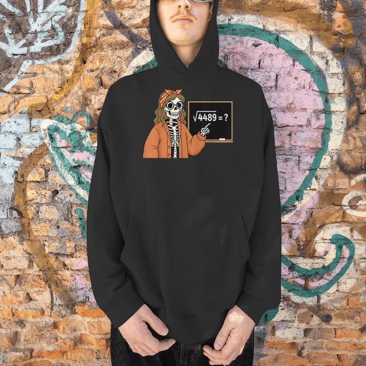 67 Math Teacher Skeleton Halloween Root 4489 Messy Bun Women Men Hoodie, gift for family, gift for coworker 67 Math Teacher Skeleton Halloween Root 4489 Messy Bun Women Men Hoodie, gift for family, gift for coworker