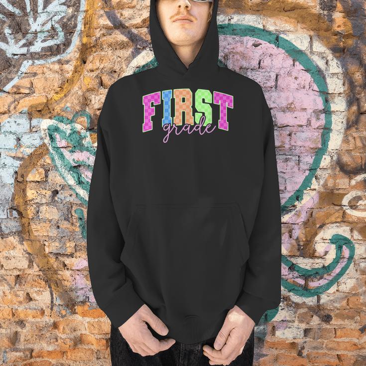 Back To School Neon Checkered First Grade Colorful Teacher Men Hoodie, First Grade Teacher Hoodies, gift for family, gift for coworker