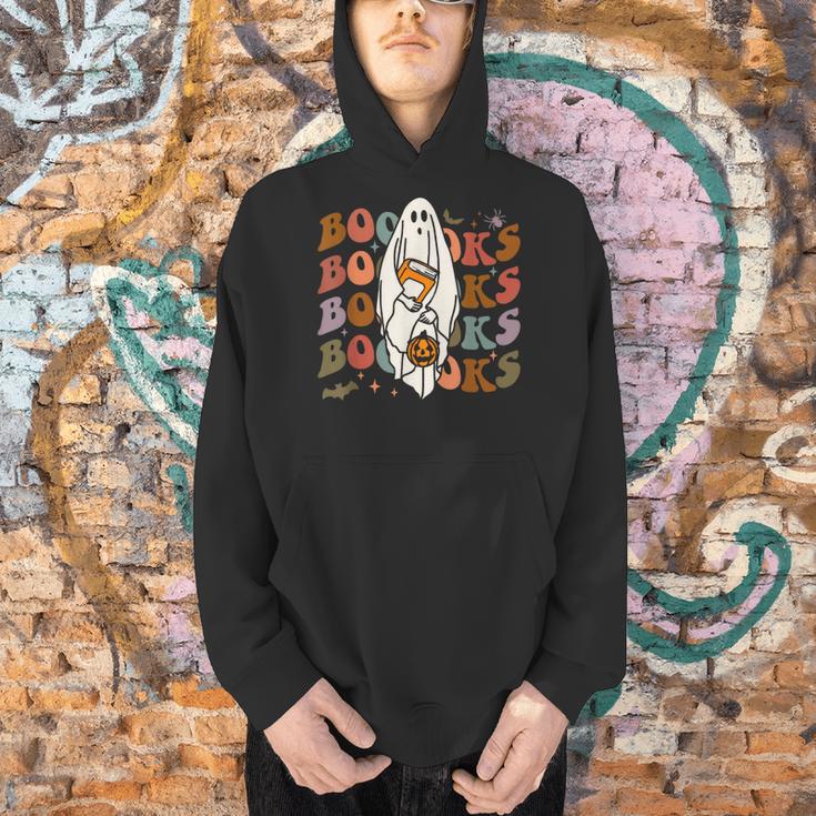 Booooks Ghost Halloween Groovy Vintage Teacher Book Reading Men Hoodie, Groovy Teacher Hoodies, gift for family, gift for coworker