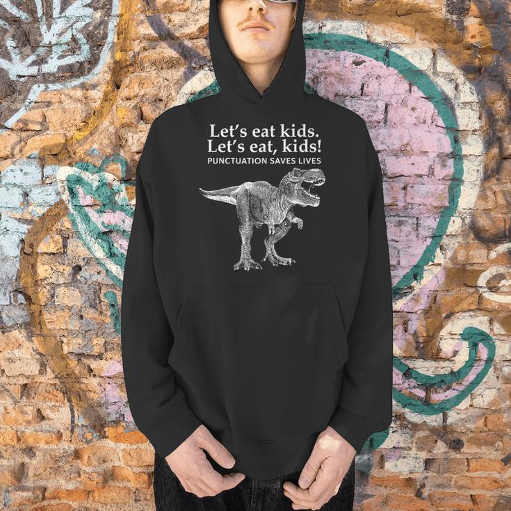 Lets Eat Kids Punctuation Saves Lives Dinosaur Teacher Men Hoodie, gift for family, gift for coworker