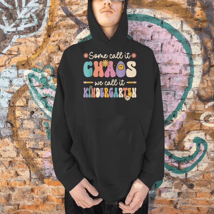 Groovy Some Call It Chaos We Call It Kindergarten Teacher Men Hoodie, Groovy Teacher Hoodies, gift for family, gift for coworker