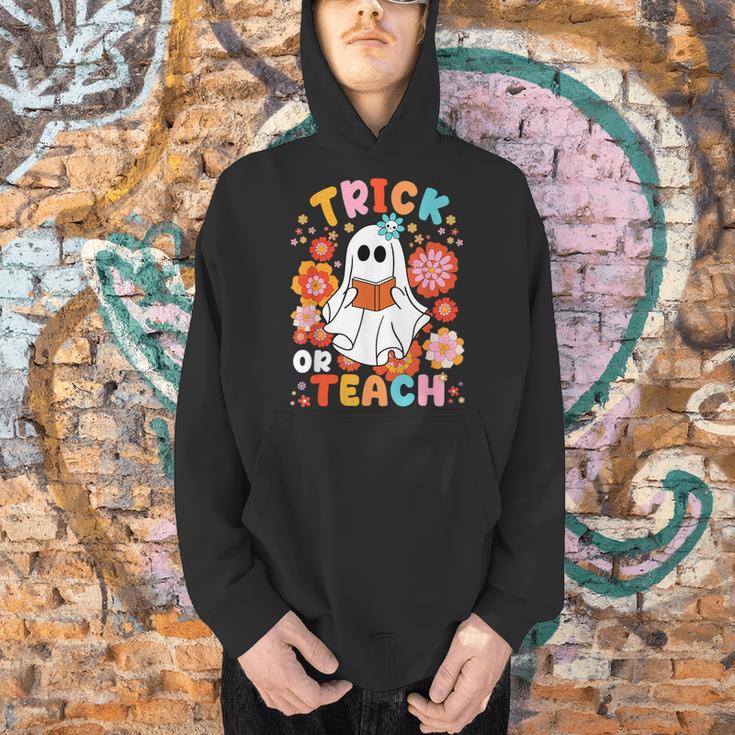 Groovy Halloween Trick Or Teach Retro Floral Ghost Teacher For Men Women Kids Men Hoodie, Groovy Teacher Hoodies, gift for family, gift for coworker