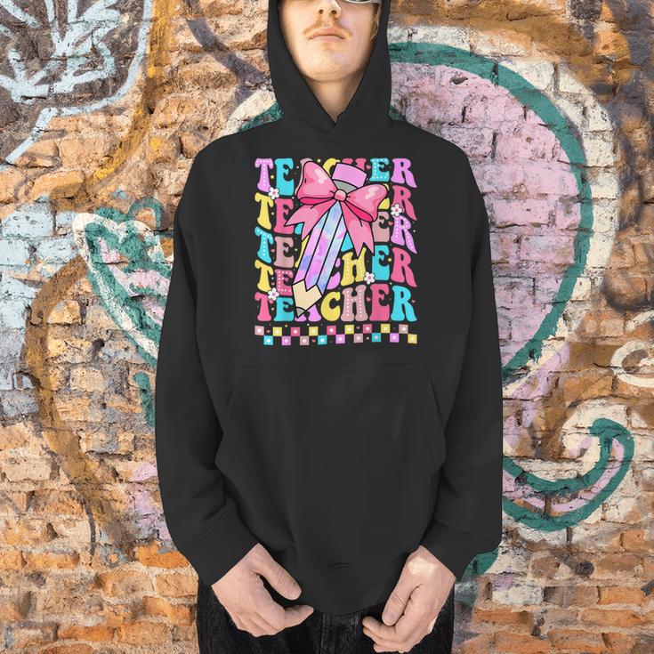 Groovy Teacher Cute Coquette Bow Flower Retro Back To School Men Hoodie, Groovy Teacher Hoodies, gift for family, gift for coworker Groovy Teacher Cute Coquette Bow Flower Retro Back To School Men Hoodie, Groovy Teacher Hoodies, gift for family, gift for coworker