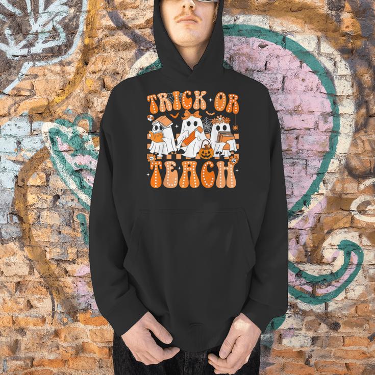 Groovy Teacher Halloween Trick Or Teach Ghost Men Women Kids Men Hoodie, Groovy Teacher Hoodies, gift for family, gift for coworker