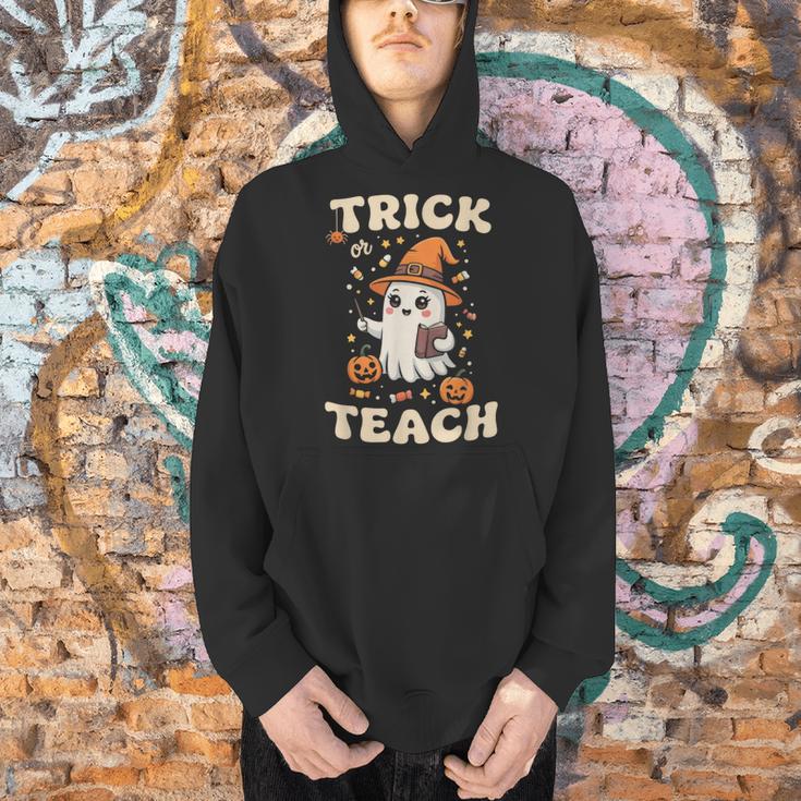 Halloween Teacher Shirts Women School Trick Or Teach Groovy Men Hoodie, Groovy Teacher Hoodies, gift for family, gift for coworker Halloween Teacher Shirts Women School Trick Or Teach Groovy Men Hoodie, Groovy Teacher Hoodies, gift for family, gift for coworker