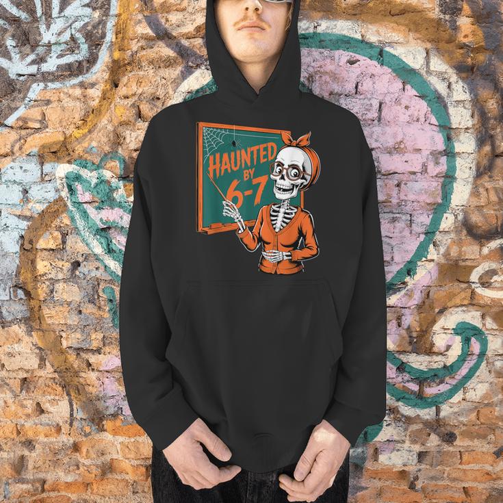 Haunted By 6-7 Six Seven 67 Math Teacher Halloween Skeleton Men Hoodie, gift for family, gift for coworker Haunted By 6-7 Six Seven 67 Math Teacher Halloween Skeleton Men Hoodie, gift for family, gift for coworker